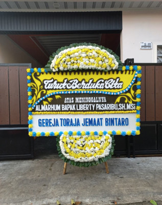 Papan Bunga Duka di Tanggikiki